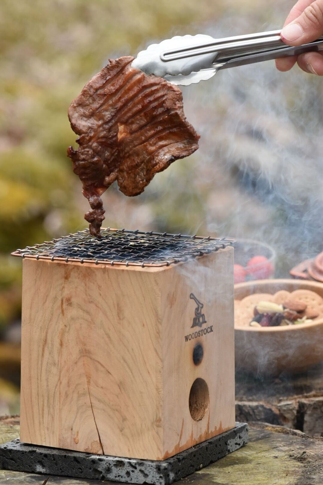 Makuake｜香ばしい炎で炙る名店の技！5種類の木で薪火調理を再現、木製