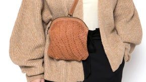 バルセロナのデザイナー作！男女兼用ウェスト、ショルダー、リスト3点併用革ポーチ