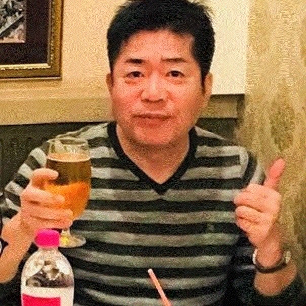 塚越敏典